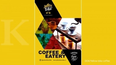 Seruput terang laba kafe sepeda kuning Seruput terang laba kafe sepeda kuning